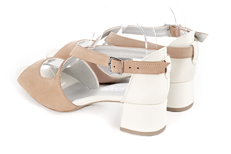 Biscuit beige and off white women's closed back sandals, with crossed straps. Round toe. Low flare heels. Rear view - Florence KOOIJMAN